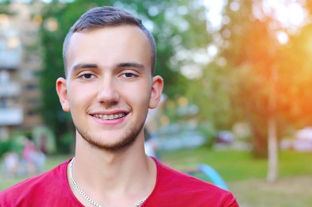 A person smiling at the camera
AI-generated content may be incorrect.